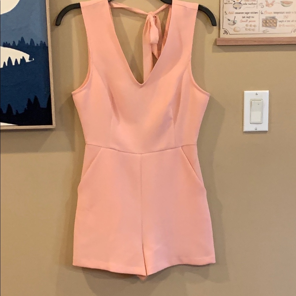 BCBGeneration soft peach  Sleeveless Romper with Defined Waistline